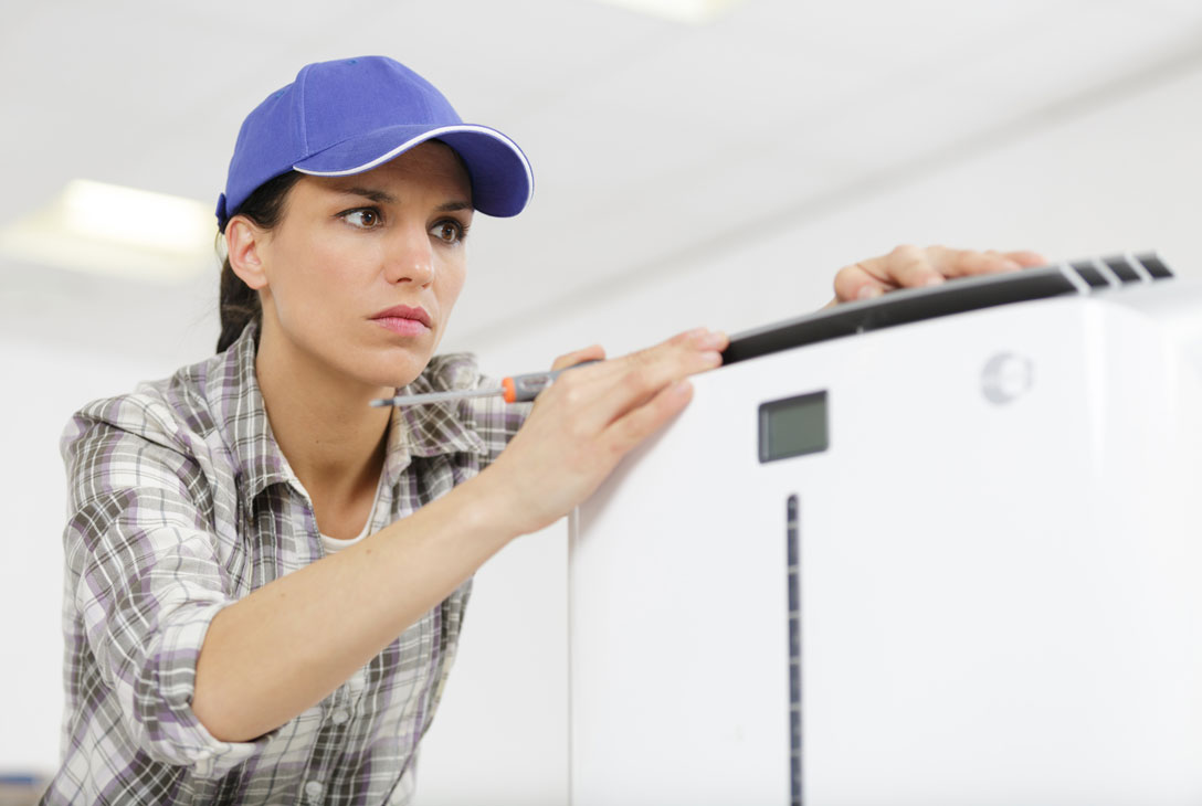 Professional Working on Home Ventilation System